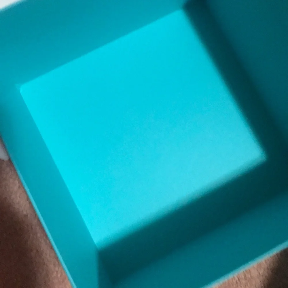 Tiffany box in very good condition plus a small bag of